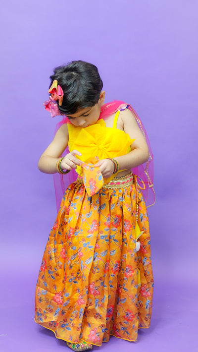 Yellow Lehenga Set with floral pattern with potli